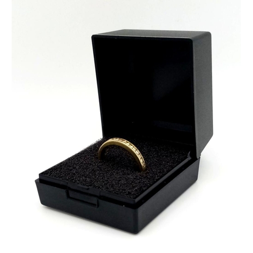 385 - Tasteful and subtle 18 carat GOLD RING. Set to top with DIAMONDS in half hoop eternity style. Approx... 