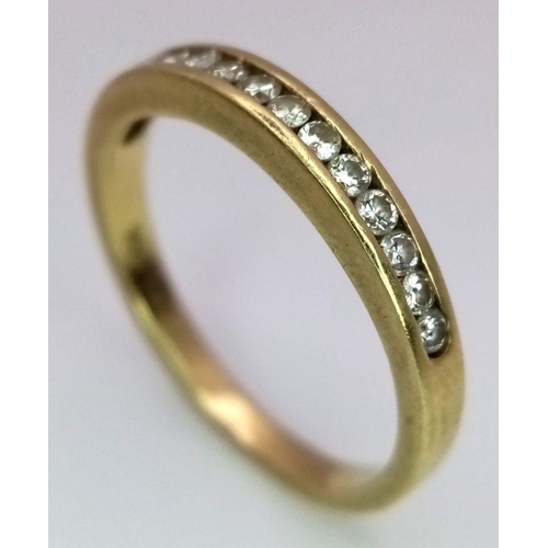 385 - Tasteful and subtle 18 carat GOLD RING. Set to top with DIAMONDS in half hoop eternity style. Approx... 