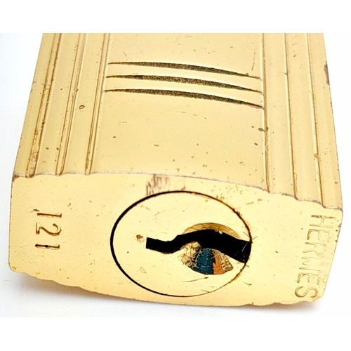 408 - A Gold Tone Hermes Branded Small Padlock with Two Keys.