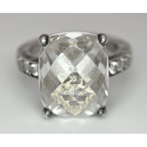 427 - THOMAS SABO SILVER RING. 4.5 carat Cushion cut Crystal Quartz set to top. Ring signed to inside band... 