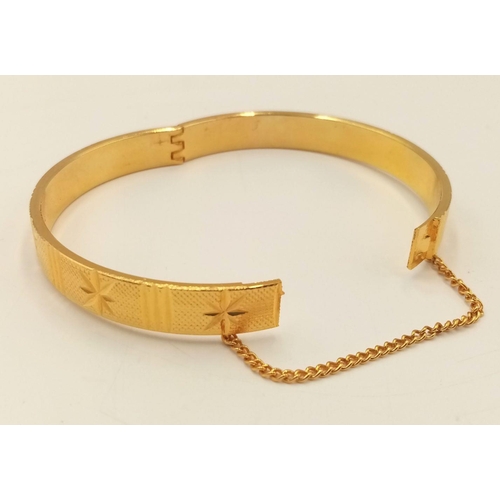 637 - Impressive Vintage 18 carat Rolled Gold plated BANGLE. Complete with safety chain. Diamond cut chase... 