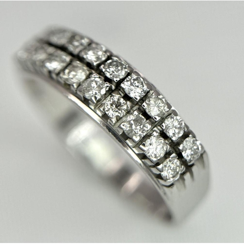 596 - An 18K White Gold and Two Row Diamond Ring. 18 brilliant round cut diamonds - 0.90ctw. Size Q. 4.4g ... 