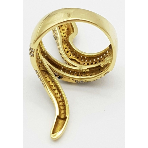 508 - A Tempting 18K Yellow Gold, Sapphire and Diamond Serpent Ring. This ruby eyed reptile will coil arou... 