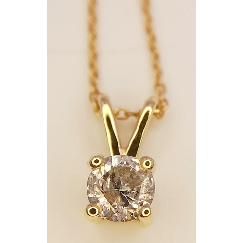 540 - An 18K Yellow Gold and 0.35ct Brilliant Cut Diamond Pendant  on an 18K Yellow Gold Disappearing Neck... 