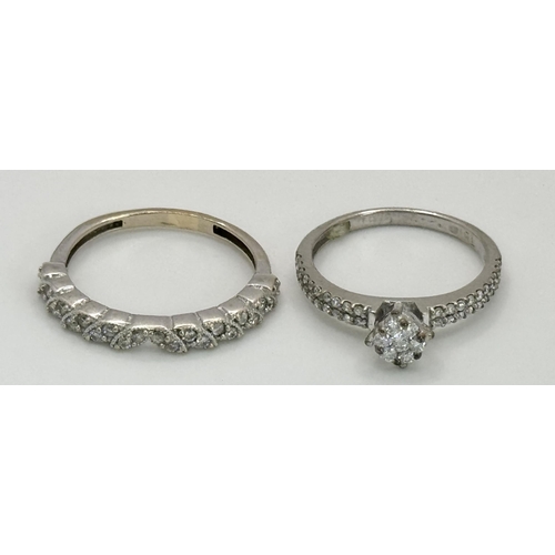 561 - Two 18K White Gold and Diamond Rings. An 18K White gold and diamond cluster ring - size M. An 18K wh... 