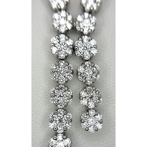 575 - An 18K White Gold and Diamond Necklace with Diamond Drops. 3ctw diamonds. 42cm length. 2.5cm diamond... 