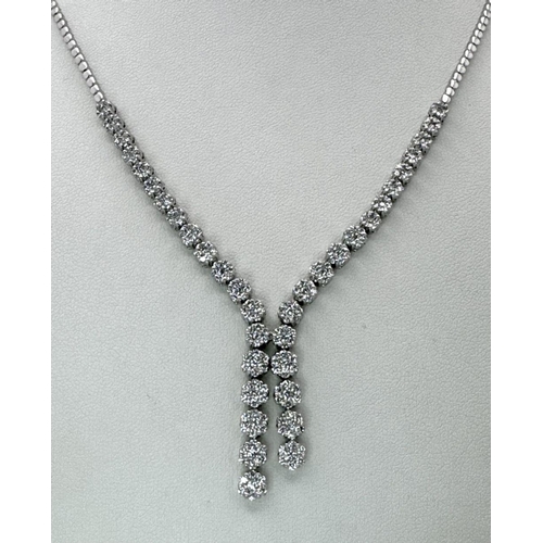 575 - An 18K White Gold and Diamond Necklace with Diamond Drops. 3ctw diamonds. 42cm length. 2.5cm diamond... 