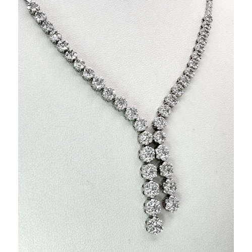 575 - An 18K White Gold and Diamond Necklace with Diamond Drops. 3ctw diamonds. 42cm length. 2.5cm diamond... 