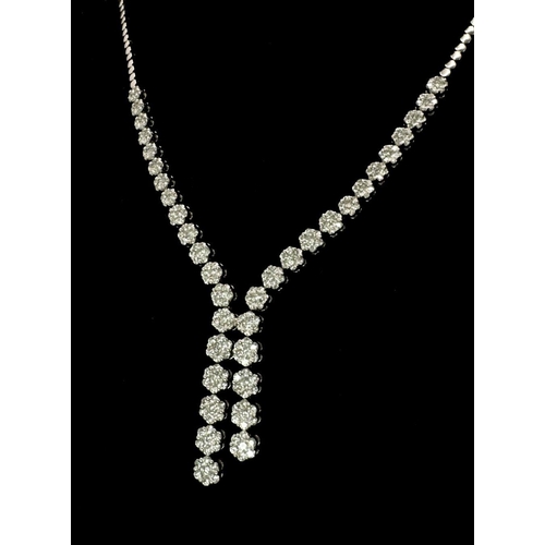 575 - An 18K White Gold and Diamond Necklace with Diamond Drops. 3ctw diamonds. 42cm length. 2.5cm diamond... 