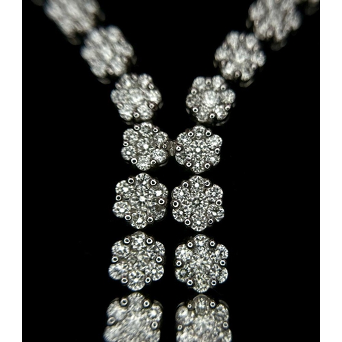 575 - An 18K White Gold and Diamond Necklace with Diamond Drops. 3ctw diamonds. 42cm length. 2.5cm diamond... 