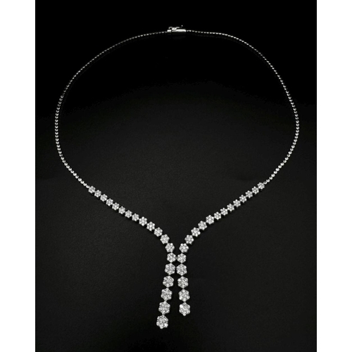 575 - An 18K White Gold and Diamond Necklace with Diamond Drops. 3ctw diamonds. 42cm length. 2.5cm diamond... 