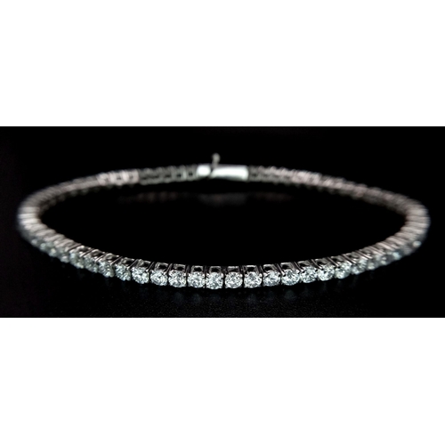 603 - An 18K White Gold Diamond Tennis Bracelet. 3ctw of brilliant round cut diamonds. 17cm length. 8.4g t... 