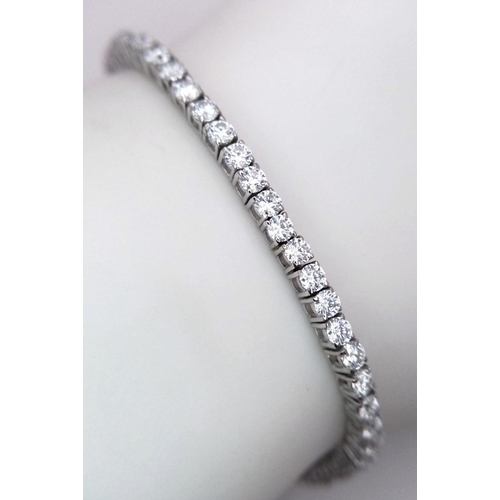 603 - An 18K White Gold Diamond Tennis Bracelet. 3ctw of brilliant round cut diamonds. 17cm length. 8.4g t... 