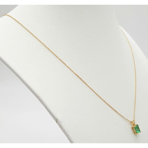 624 - An 18K Gold and Emerald Pendant on an 18K Gold Disappearing Necklace. 10mm and 44cm. 1.7g total weig... 