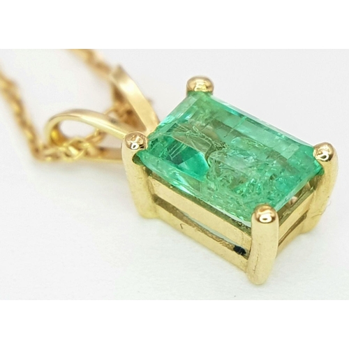 624 - An 18K Gold and Emerald Pendant on an 18K Gold Disappearing Necklace. 10mm and 44cm. 1.7g total weig... 