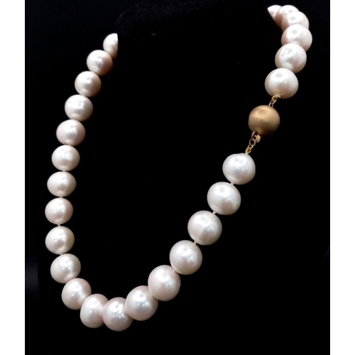 652 - A Large Pearl Bead Necklace with 9K Gold Fancy Clasp. Pearls - 14/15mm. Necklace length - 42cm.