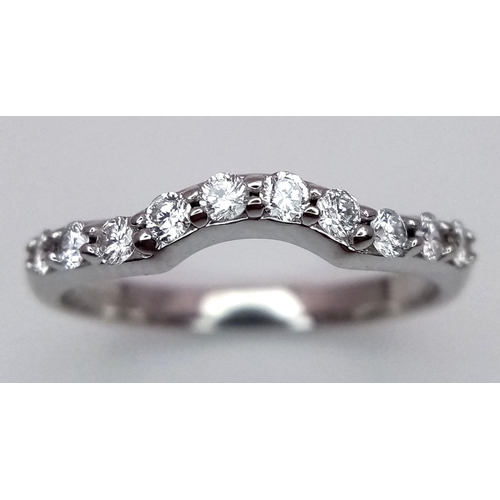 653 - A Designer, Michael Hill 18K White Gold and Diamond Ring. 10 round cut diamonds. Size K 1/2. 2.4g to... 