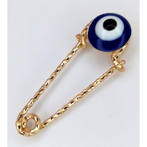 666 - An 18K Yellow Gold and Enamel Evil Eye Pendant. 2cm. 0.52g