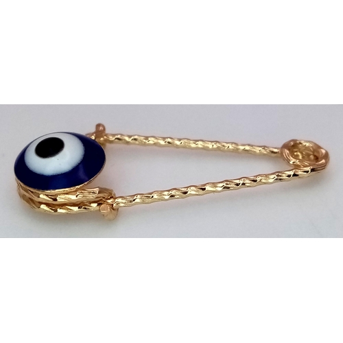 666 - An 18K Yellow Gold and Enamel Evil Eye Pendant. 2cm. 0.52g