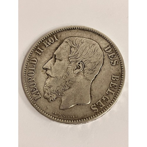 658 - 1870 LEOPOLD II of  BELGIUM SILVER 5 FRANC COIN. Condition EF. Having bold and raised definition to ... 