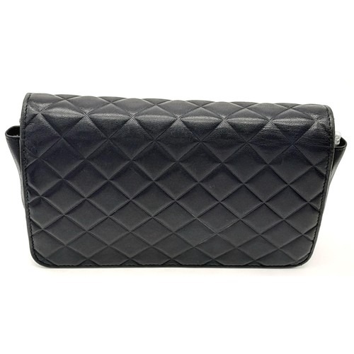 377 - A Chanel Blue Wallet on Chain Crossbody Bag. Quilted leather exterior with silver-toned hardware, ch... 