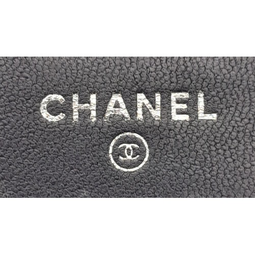 377 - A Chanel Blue Wallet on Chain Crossbody Bag. Quilted leather exterior with silver-toned hardware, ch... 