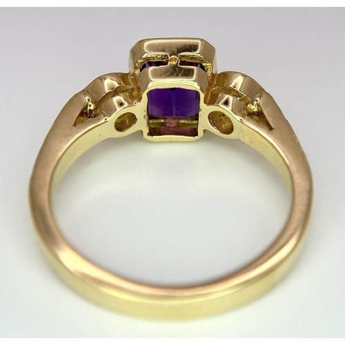 102 - An 18K Yellow Gold, Amethyst and Diamond Ring. 1ct central amethyst with a 0.15ct brilliant round cu... 