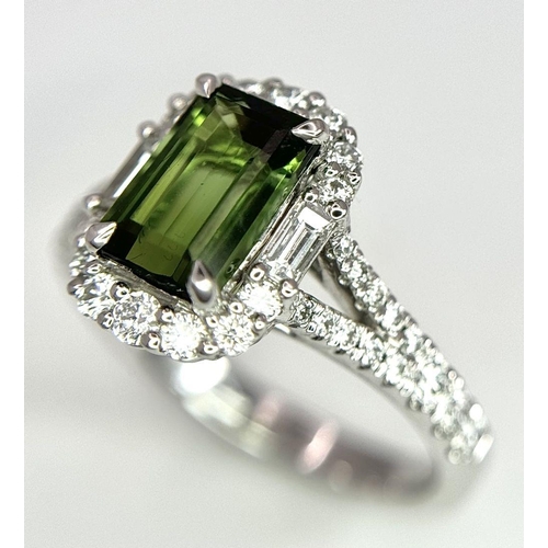 116 - An 18K White Gold Green Tourmaline Ring. Rectangular 1.63ct tourmaline with a sophisticated diamond ... 