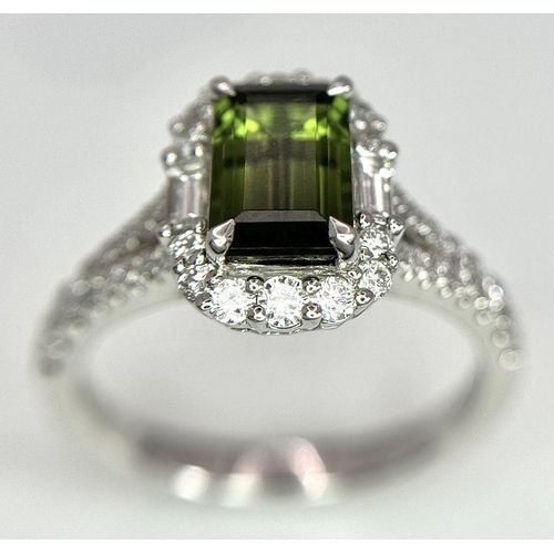 116 - An 18K White Gold Green Tourmaline Ring. Rectangular 1.63ct tourmaline with a sophisticated diamond ... 