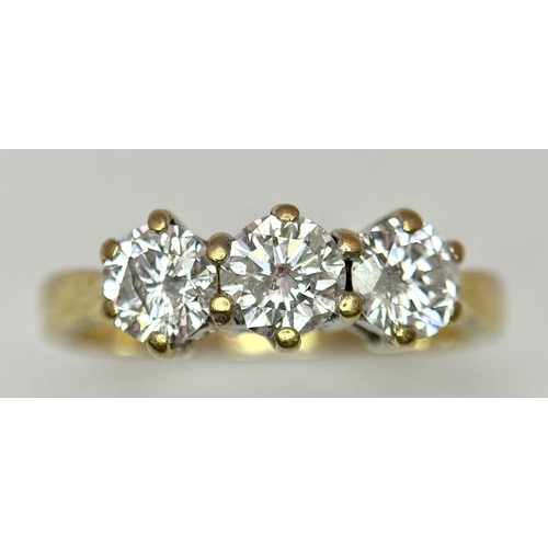 48 - AN 18K YELLOW GOLD DIAMOND 3 STONE RING - 0.90CT. 3.1G. SIZE N. 

REF: A/S 1086