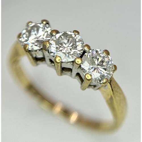 48 - AN 18K YELLOW GOLD DIAMOND 3 STONE RING - 0.90CT. 3.1G. SIZE N. 

REF: A/S 1086