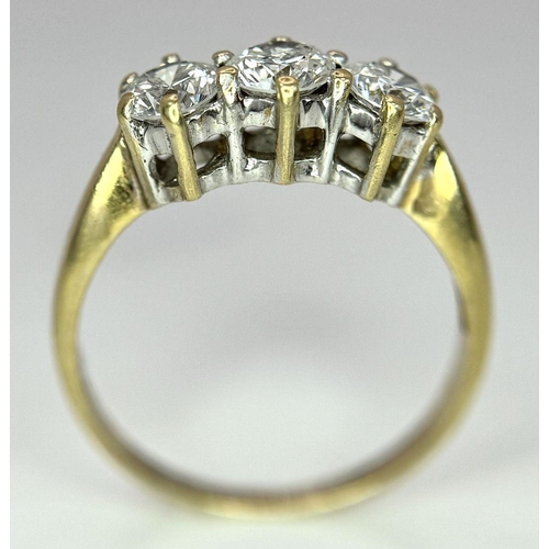 48 - AN 18K YELLOW GOLD DIAMOND 3 STONE RING - 0.90CT. 3.1G. SIZE N. 

REF: A/S 1086