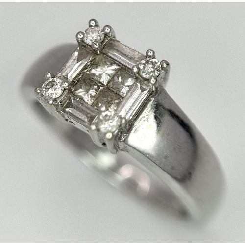 62 - AN 18K WHITE GOLD DIAMOND RING. 0.63CT. 5.4G. SIZE L.
REF: JR5