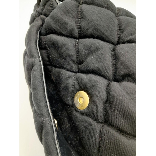 19 - A Chanel Bubble Quilted Flap Bag. Black quilted fabric exterior with gold-toned hardware, CC logo, d... 