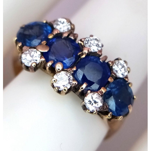 29 - A Gorgeous 18K Yellow Gold, Diamond and Sapphire Ring. Four deep blue round sapphires - 2ctw, with t... 