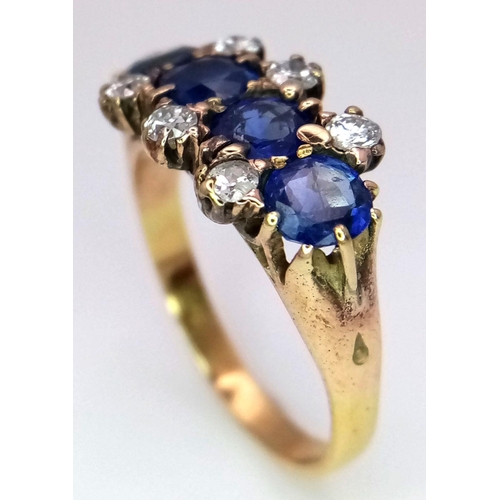 29 - A Gorgeous 18K Yellow Gold, Diamond and Sapphire Ring. Four deep blue round sapphires - 2ctw, with t... 