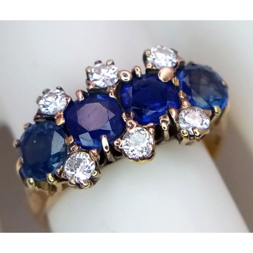 29 - A Gorgeous 18K Yellow Gold, Diamond and Sapphire Ring. Four deep blue round sapphires - 2ctw, with t... 