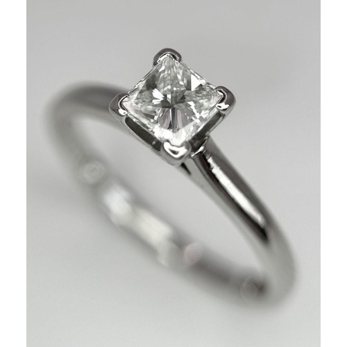 34 - A PLATINUM DIAMOND SOLITAIRE RING - 0.50CT PRINCESS CUT. 4.1G. SIZE L. 

REF: A/S 1069