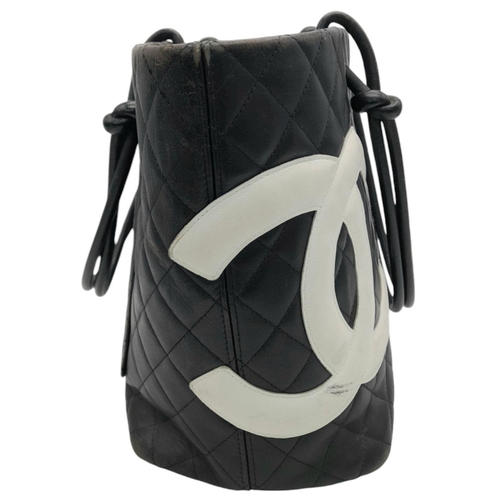 40 - A Chanel Black Cambon Tot Bag. Quilted leather exterior with silver-toned hardware, two double strap... 