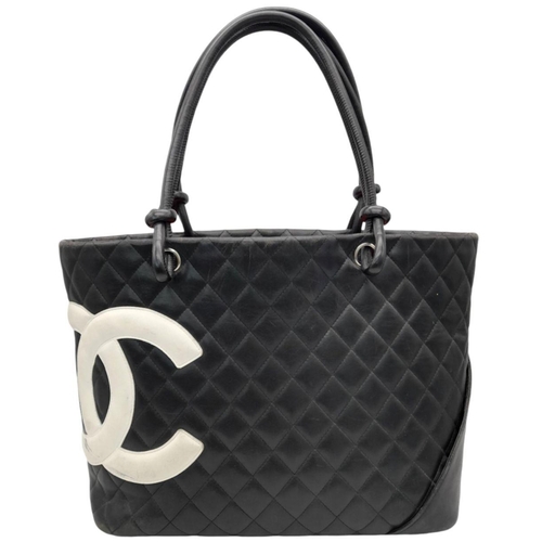 40 - A Chanel Black Cambon Tot Bag. Quilted leather exterior with silver-toned hardware, two double strap... 