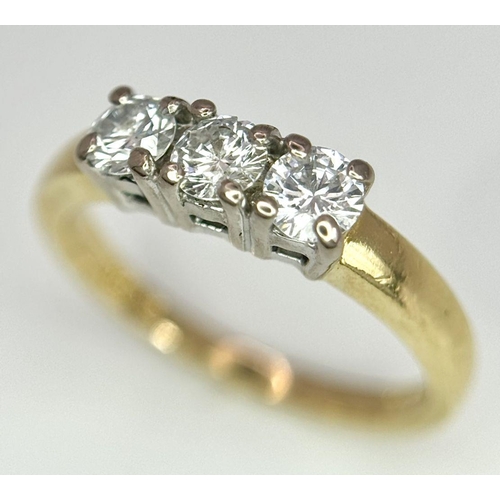 55 - AN 18K YELLOW GOLD 3 STONE DIAMOND RING - 0.50CT. 3.7G. SIZE L. 

REF: SPAS5001.