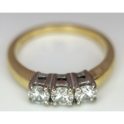 55 - AN 18K YELLOW GOLD 3 STONE DIAMOND RING - 0.50CT. 3.7G. SIZE L. 

REF: SPAS5001.