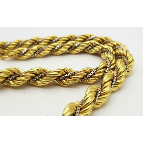 6 - A Graduating 18K Yellow Gold Rope Chain Intertwined with an 18K White Gold Venetian Chain. 40cm. 44.... 