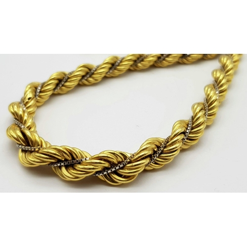 6 - A Graduating 18K Yellow Gold Rope Chain Intertwined with an 18K White Gold Venetian Chain. 40cm. 44.... 