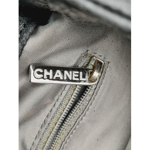 68 - A Chanel Crinkled coated Canvas Le Marais Hobo Bag. Black soft crinkled coated canvas, silver-toned ... 