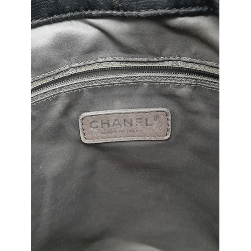 68 - A Chanel Crinkled coated Canvas Le Marais Hobo Bag. Black soft crinkled coated canvas, silver-toned ... 