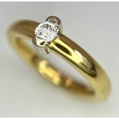 69 - AN 18K YELLOW GOLD DIAMOND SOLITAIRE RING - 0.15CT. 7.6G. SIZE M. REF: JR12