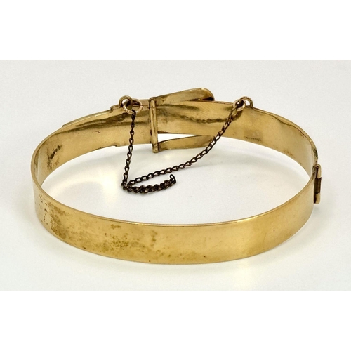 98 - Vintage ROLLED GOLD BUCKLE BANGLE. Complete with safety chain. Presented in jewellers box.  17.4 gra... 