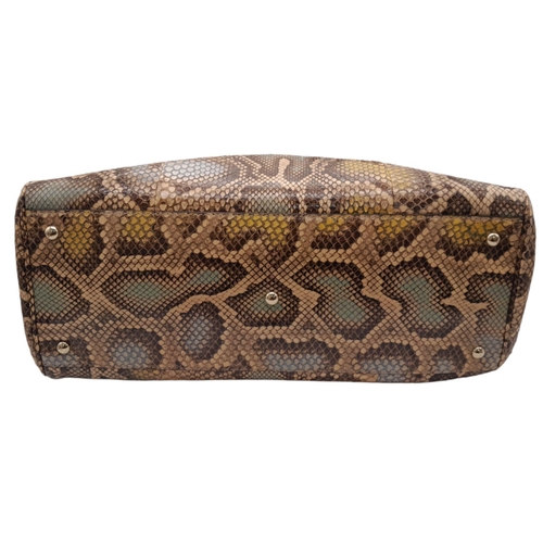 33 - A Gucci Python Bamboo Top Handle Bag. Python skin exterior in shades of brown and beige, gold-toned ... 