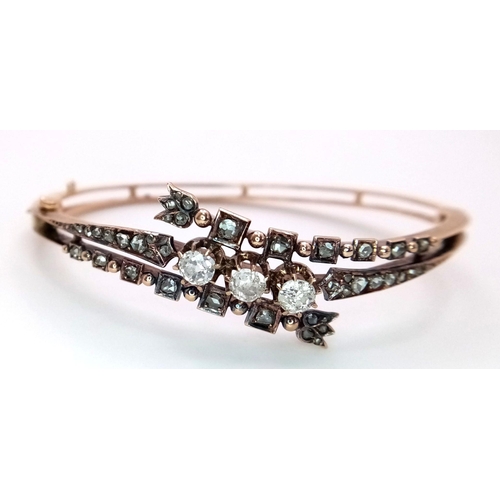 15 - A 18K Yellow Gold 45 Old Cut Diamond Set Bangle, 16.7g total weight, 5cm diameter.

ref: SS01